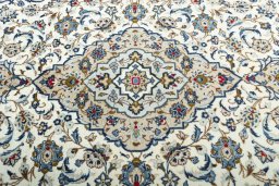 Central medallion detail of 2000s Kashan rug from Iran / Persia