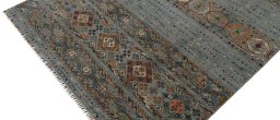 Backside of handmade New Samarkand rug showing knot structure and weave density