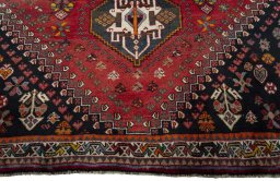 Close-up detail of 2000s Shiraz rug from Iran / Persia showing Wool weave