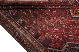 Full view of 2000s Shiraz rug from Iran / Persia, 277 × 193 cm in Red tones