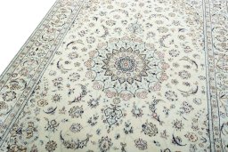 Backside of handmade 2000s Nain rug showing knot structure and weave density