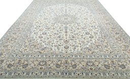Surface texture of 2000s Kashan rug with natural Wool and intricate pattern