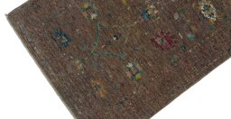 Backside of handmade New Farahan rug showing knot structure and weave density