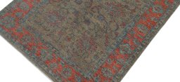 Backside of handmade New Farahan rug showing knot structure and weave density