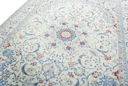 Backside of handmade 2000s Nain rug showing knot structure and weave density