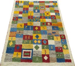 Surface texture of 2000s Persian Gabbeh rug with natural Wool and intricate pattern