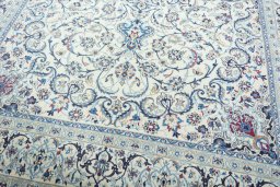 Close-up detail of 2000s Nain rug from Iran / Persia showing Wool weave