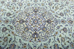 Central medallion detail of 2000s Kashan rug from Iran / Persia