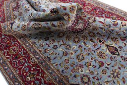 Surface texture of 2000s Kashan rug with natural Wool and intricate pattern