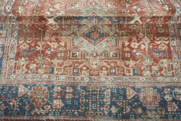 Corner detail of 1930s Heriz rug showing border pattern and Wool pile
