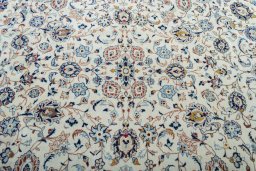 Central medallion detail of 2000s Kashan rug from Iran / Persia