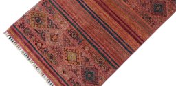 Backside of handmade New Samarkand rug showing knot structure and weave density