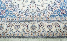 Full view of 2000s Nain rug from Iran / Persia, 338 × 215 cm in Beige tones