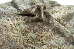 Surface texture of New Tabriz 50/60/70 Raj rug with natural Cork and intricate pattern