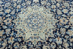 Central medallion detail of 2000s Nain rug from Iran / Persia