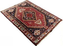 Close-up detail of 2000s Shiraz rug from Iran / Persia showing Wool weave