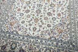 Close-up detail of 2000s Kashan rug from Iran / Persia showing Wool weave