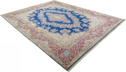 Close-up detail of 1970s Kerman rug from Iran / Persia showing Wool weave