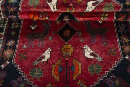Full view of 2000s Shiraz rug from Iran / Persia, 267 × 169 cm in Red tones
