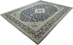Corner detail of 2000s Kashan rug showing border pattern and Wool pile