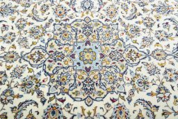 Central medallion detail of 2000s Kashan rug from Iran / Persia