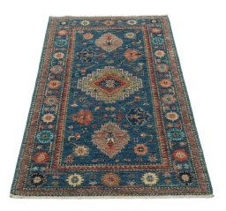 Surface texture of New Kazak rug with natural Wool and intricate pattern