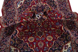 Close-up detail of 2000s Kashan rug from Iran / Persia showing Wool weave