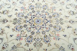 Central medallion detail of 2000s Kashan rug from Iran / Persia