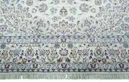 Full view of 2000s Nain rug from Iran / Persia, 295 × 200 cm in Beige tones