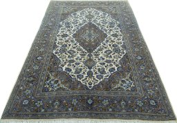 Surface texture of 2000s Kashan rug with natural Wool and intricate pattern