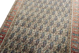 Backside of handmade 1950s Ghom rug showing knot structure and weave density