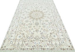 Surface texture of 2000s Nain rug with natural Wool and intricate pattern