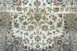 Close-up detail of New Kashan rug from Iran / Persia showing Wool weave