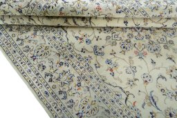 Close-up detail of 2000s Kashan rug from Iran / Persia showing Wool weave