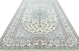Surface texture of New Nain rug with natural Wool and intricate pattern
