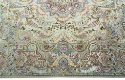 Corner detail of New Tabriz 50/60/70 Raj rug showing border pattern and Cork pile
