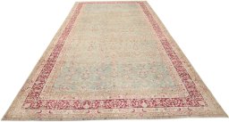 Surface texture of 1920s Farahan rug with natural Wool and intricate pattern