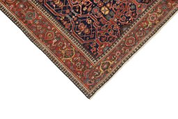Backside of handmade 1900s Farahan rug showing knot structure and weave density