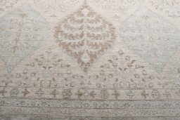 Backside of handmade New Farahan rug showing knot structure and weave density