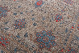 Backside of handmade New Farahan rug showing knot structure and weave density