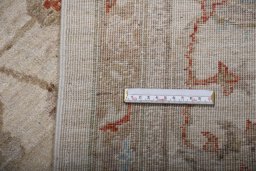 Backside of handmade New Farahan rug showing knot structure and weave density