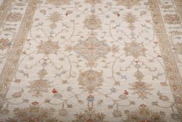 Backside of handmade New Farahan rug showing knot structure and weave density