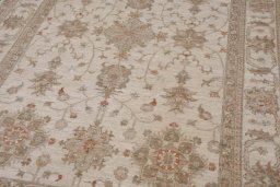 Backside of handmade New Farahan rug showing knot structure and weave density