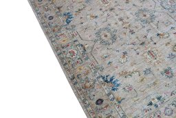 Backside of handmade New Farahan rug showing knot structure and weave density