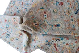Backside of handmade New Farahan rug showing knot structure and weave density
