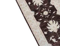Backside of handmade New Farahan rug showing knot structure and weave density