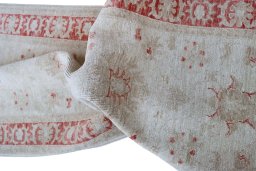 Backside of handmade New Farahan rug showing knot structure and weave density