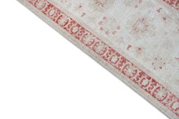Backside of handmade New Farahan rug showing knot structure and weave density
