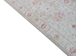 Backside of handmade New Farahan rug showing knot structure and weave density