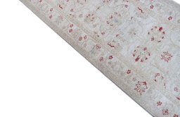 Backside of handmade New Farahan rug showing knot structure and weave density